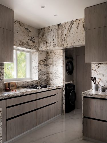 Kitchen with heavily veined stone walls, wood cabinetry, and built-in washer-dryer niche