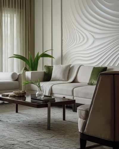 Living room with sectional sofa, green velvet cushions, and a sculptural wave-textured white wall panel