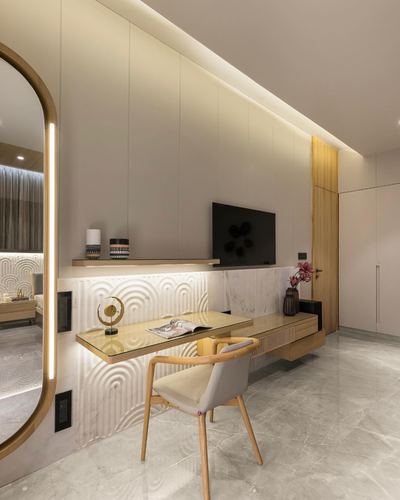Wall-mounted desk with tv above, patterned marble backsplash, arched mirror in soft-lit study corner