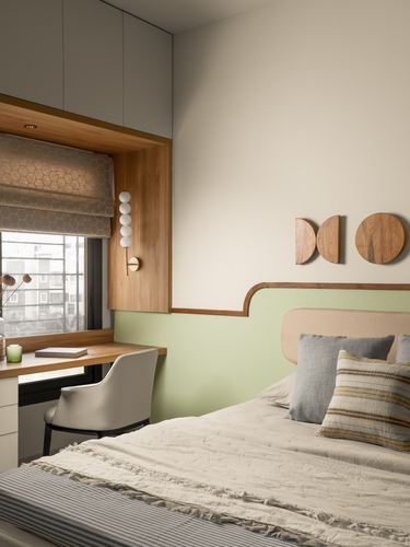 Bedroom corner with curved wood window nook, study desk, and green upholstered headboard bed