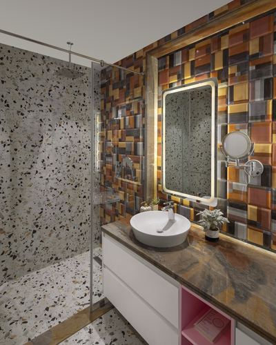 Bathroom with terrazzo shower wall, backlit mirror, vessel sink and mosaic tiled feature wall
