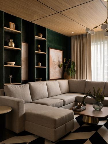 Living room with green shelving, wood ceiling, and beige sectional sofa on graphic rug