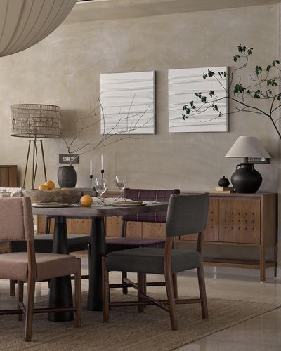Dining area with sculptural wood table, mixed chairs, sideboard, and textured wall panels