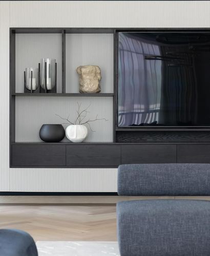Dark wood media wall with open shelves holding vases beside a mounted television, sofas in front