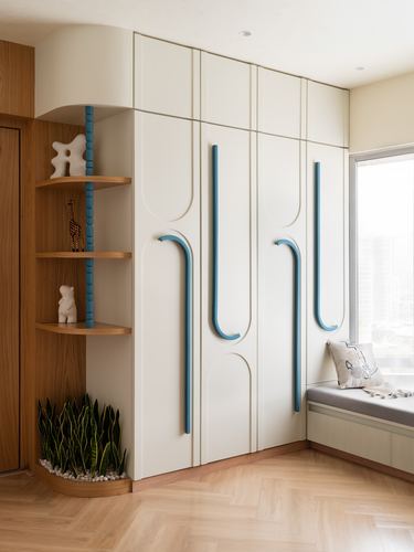 Kids' bedroom wardrobe with sculpted blue handles beside a wooden corner shelf and window seat