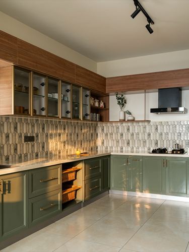 L-shaped kitchen with olive green cabinets, wood upper units, and scalloped tile backsplash