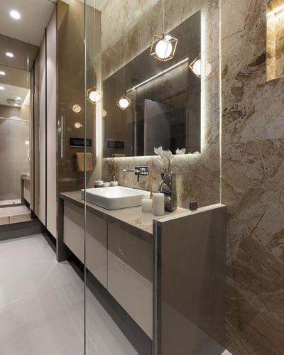 Modern bathroom vanity with backlit marble wall, vessel sink and geometric pendant lights