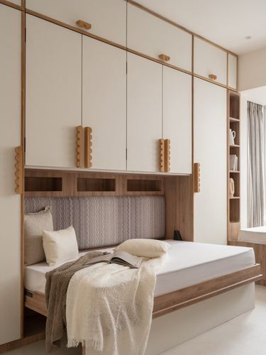 Built-in wardrobe wall with scalloped wooden handles above a daybed with textured headboard