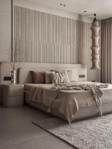 Beige bedroom with fluted wood wall, upholstered bed, and tiered pendant lamp beside curtained window
