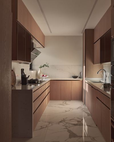 Galley kitchen with wood cabinetry, marble-look backsplash and floor, warm ambient light