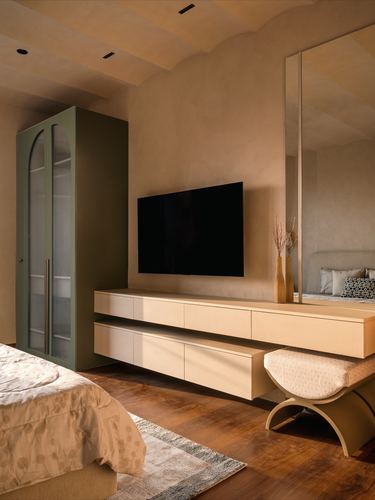 Bedroom with green wardrobe, wall tv, floating console, mirror and curved stool on wood floor