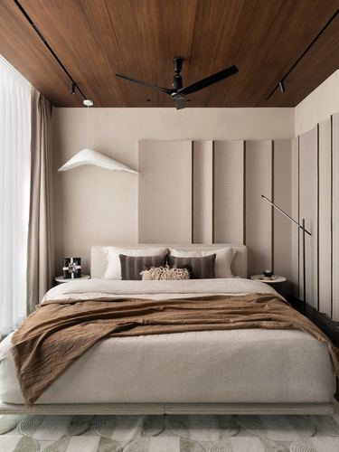 Bedroom with wood ceiling, fluted panel headboard, sculptural pendant light and layered linens